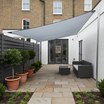 Light gray waterproof triangle sail in townhouse