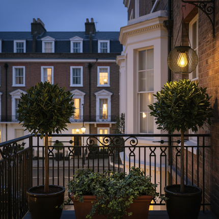 Sophisticated townhouse balcony at twilight